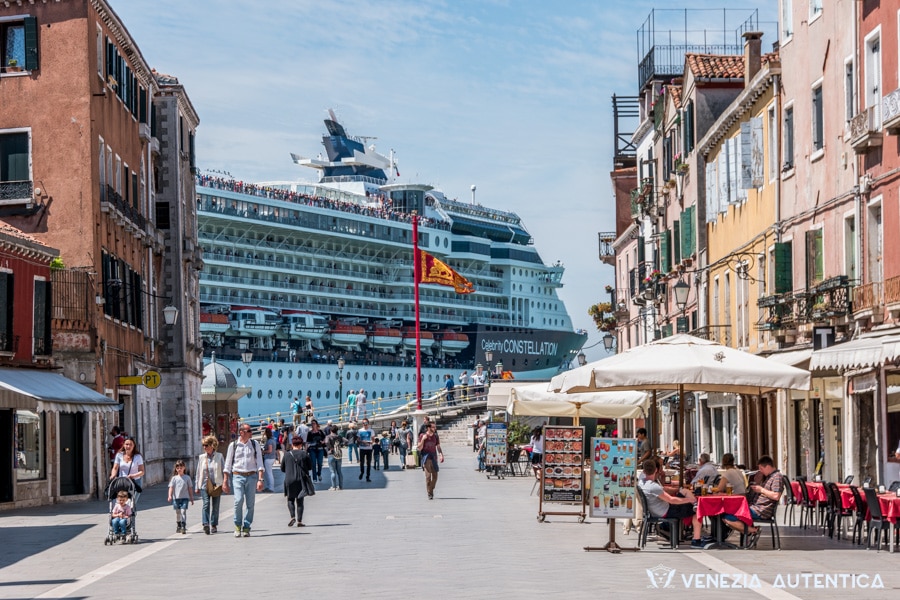 Big Cruise Ship passing in front of Via Garibaldi in Venice, Italy. Cruise ships pass right in the heart of Venice.